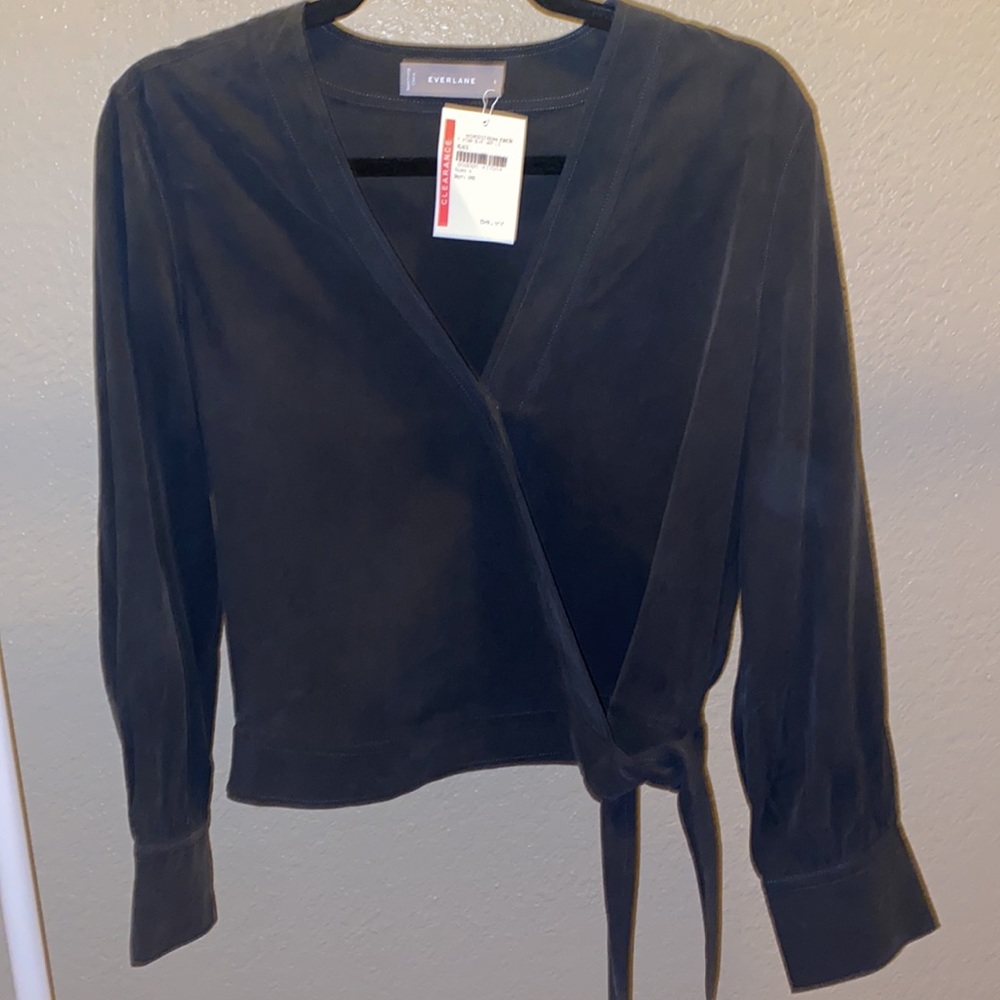 NWT Black blouse with cross bottom and ties